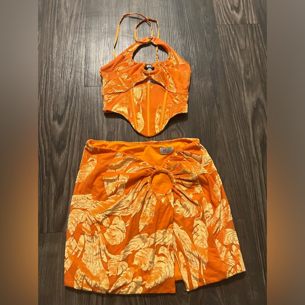 Oh Polly Ring Detail Halter Neck Crop Top and Split Mini Skirt in Orange.